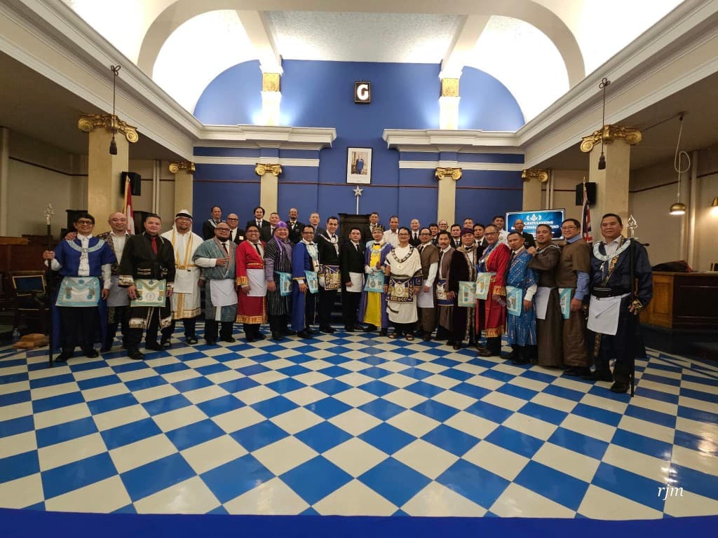 Members of Pearl of the Orient Lodge No. 206 gathered in the lodge room.